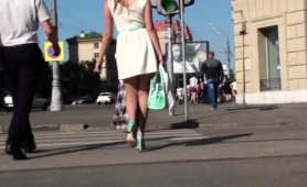 voyeur-follows-a-gorgeous-russian-teen-in-fishnet-stockings