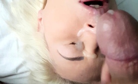 Blonde wife gets her face covered in cum in this amateur video