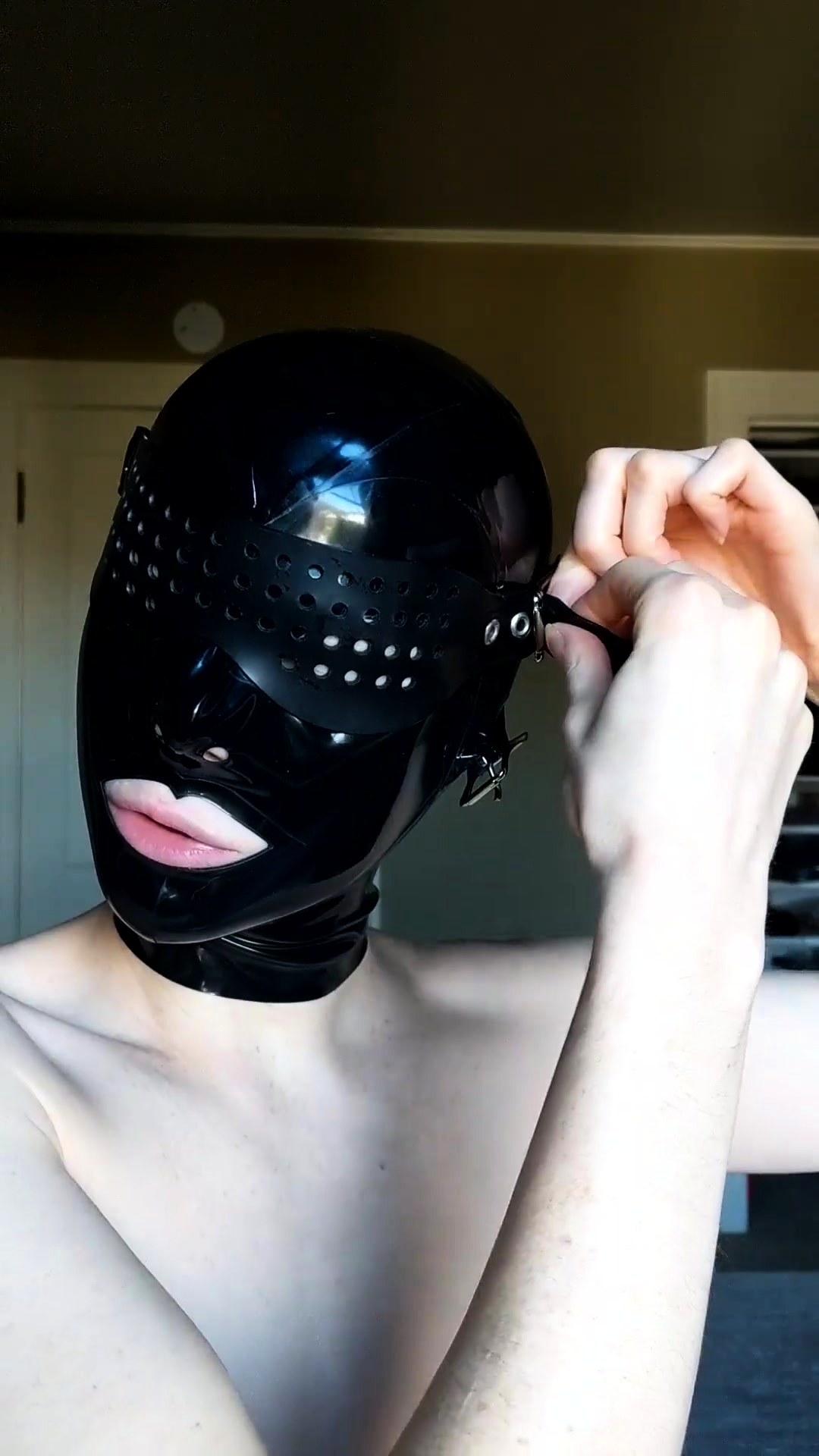 Beautiful Amateur BDSM Fetishist Trying On Latex Hood Mask Video at Porn pic